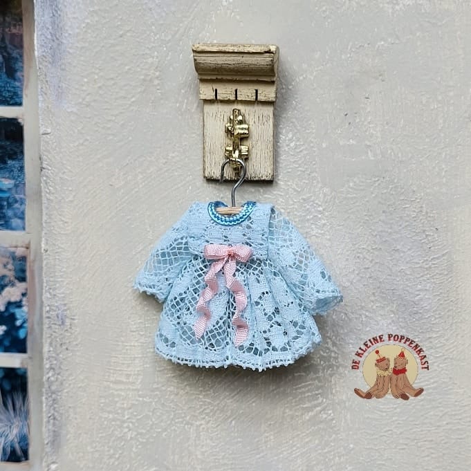Jurkje van blauw kant